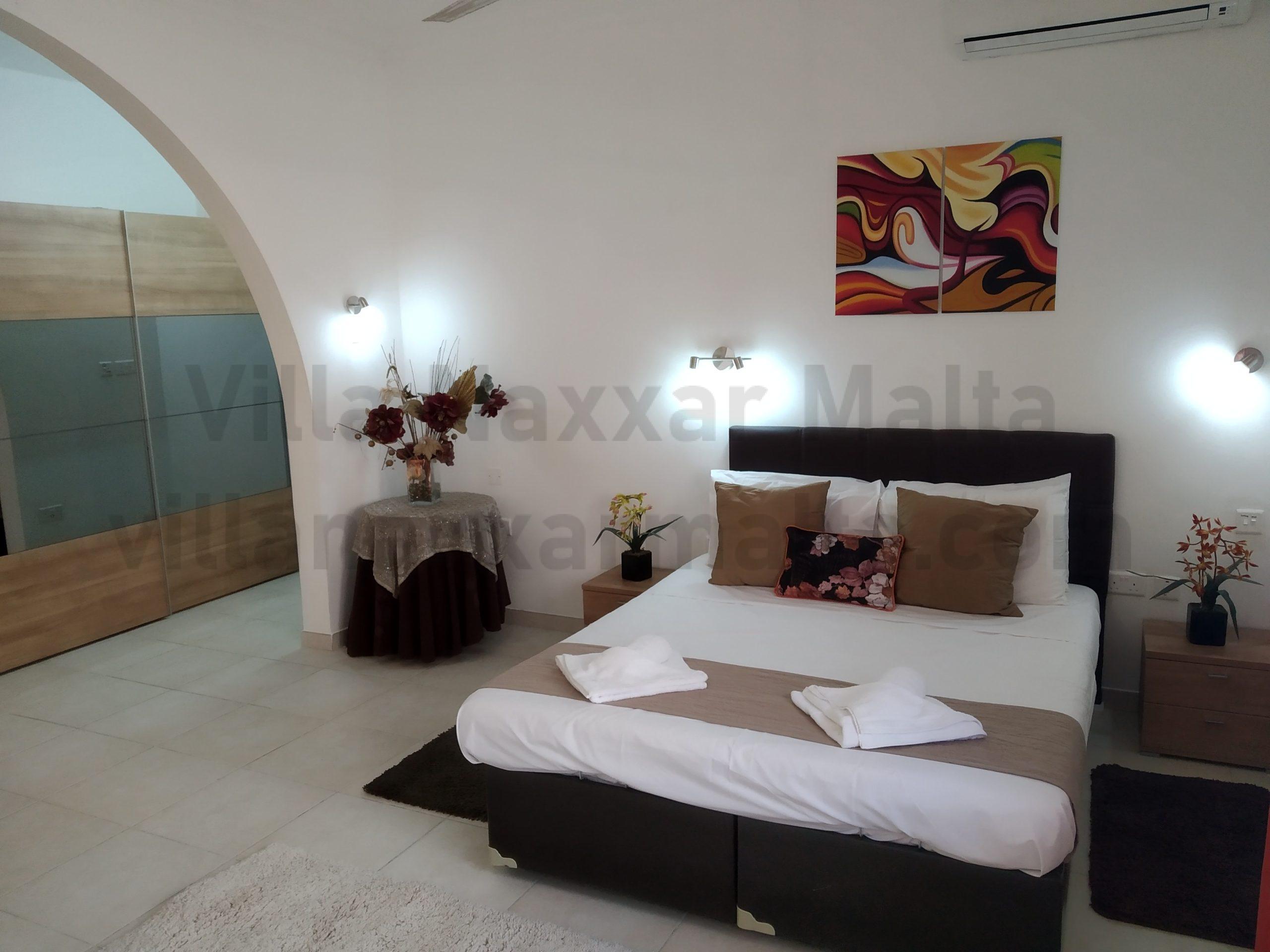Villa Naxxar Malta – Main Bedroom (double Bed) with bathroom ensuite, large wardrobes, AC, WIFI and more ... space for additional beds