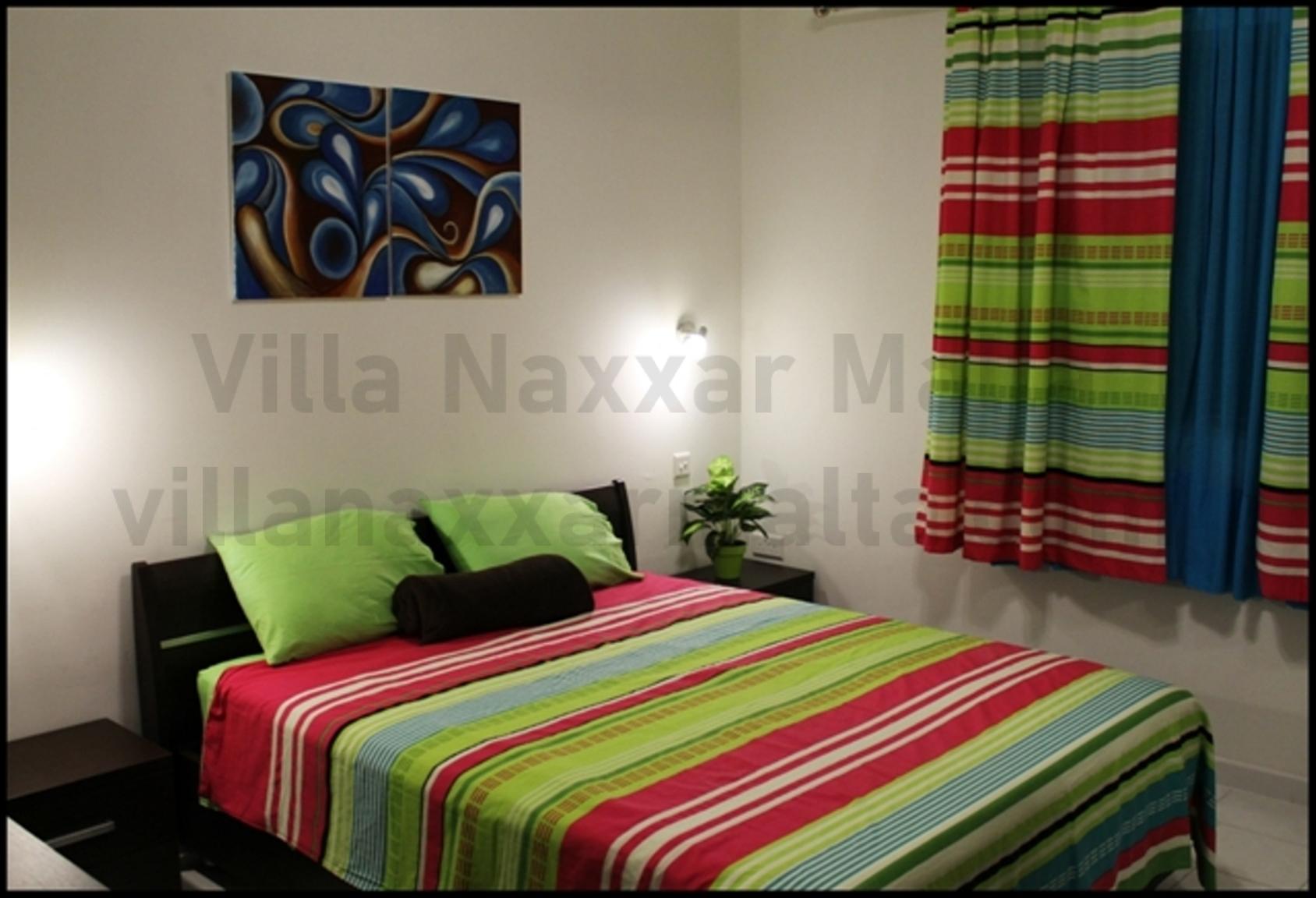 Villa Naxxar Malta – Second Bedroom (double Bed) with large wardrobes, AC, WIFI and more ... space for additional beds