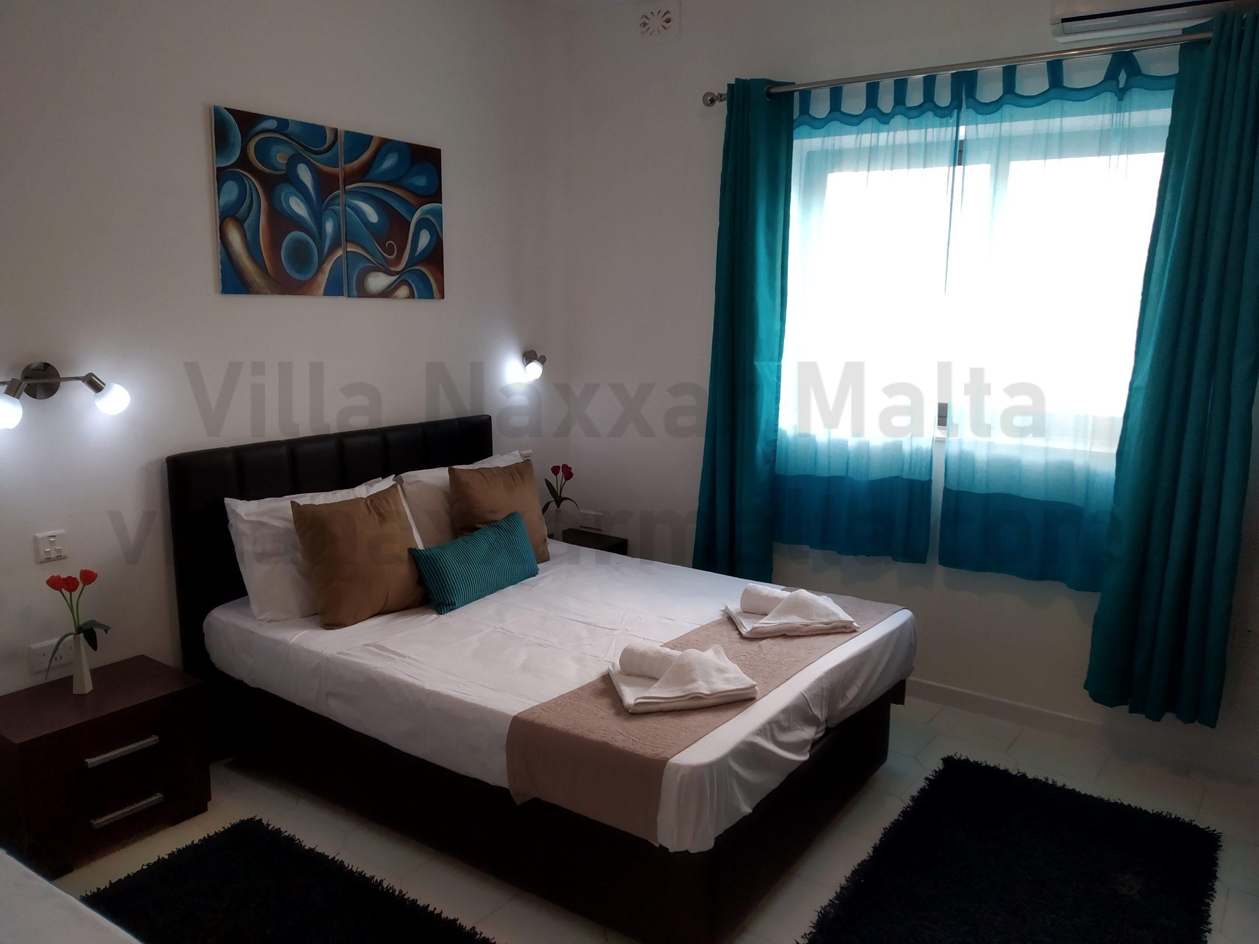 Villa Naxxar Malta – Second Bedroom (double Bed) with large wardrobes, AC, WIFI and more ... space for additional beds